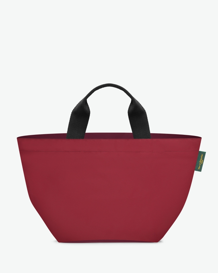 "Packshot of a 1027N tote bag
with short polyprop handles and a zipper and an inside pocket.
The bag is made of solid nylon in a medium size.
Sac cabas a poignees courtes en nylon bicolore dans un format M"