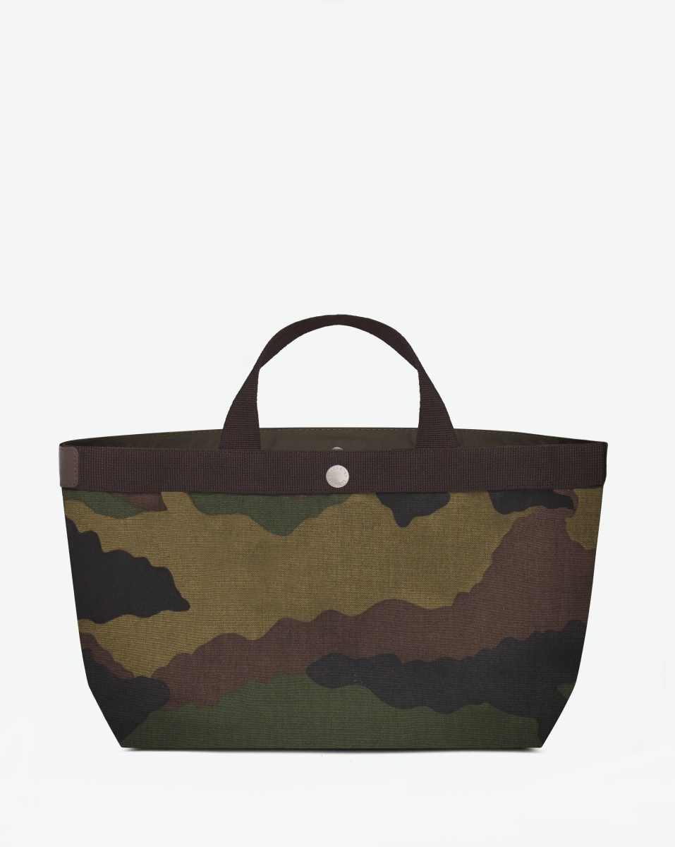 Hervé Chapelier -  - "Packshot of a 704W tote bag rectangular bottom
with short polycotton handles and webbing and a snap button.
The bag is made of camouflage printed polyamide.
Sac cabas a poignees courtes en polyamide uni format M"