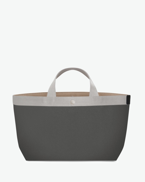 Hervé Chapelier -  - "Packshot of a 704GP tote bag rectangular bottom
with short polycotton handles and webbing and a snap button.
The bag is made of pebbled grain coated canvas.
Sac cabas a poignees courtes en polyamide uni format M"